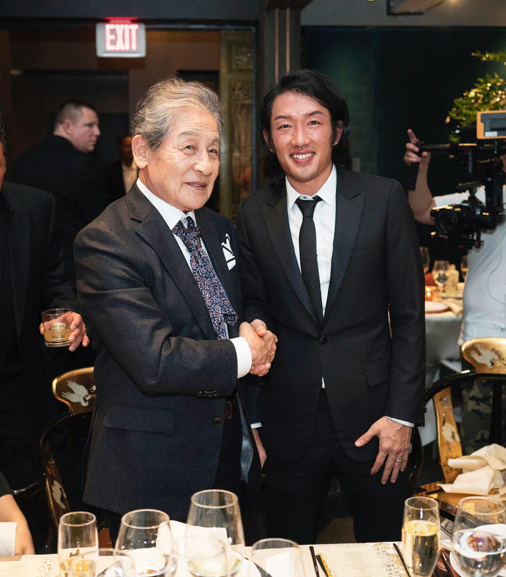 A photograph from the Passing of Sword ceremony at the Crustacean on Oct 16, 2018, with Andrew Lee and King Yi Seok.