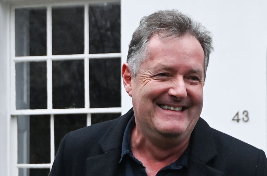 Piers Morgan smiles as he steps out of his house, after he left his job on ITV's "Good Morning Britain," following his long-running criticism of Meghan Markle, in London, March 10, 2021.