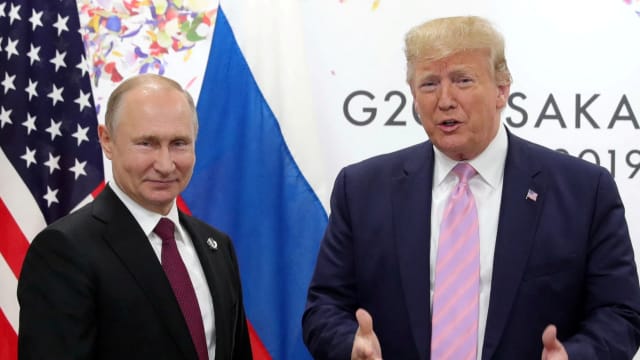 Russia's President Vladimir Putin and U.S. President Donald Trump attend a meeting on the sidelines of the G20 summit in Osaka, Japan June 28, 2019.