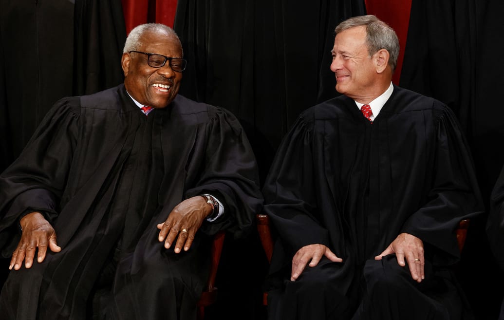 Supreme Court Associate Justice Clarence Thomas and Chief Justice John G. Roberts