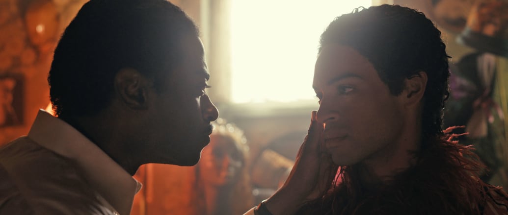 Jelani Aladdin touches Noah J. Ricketts face in a still from 'Fellow Travelers'