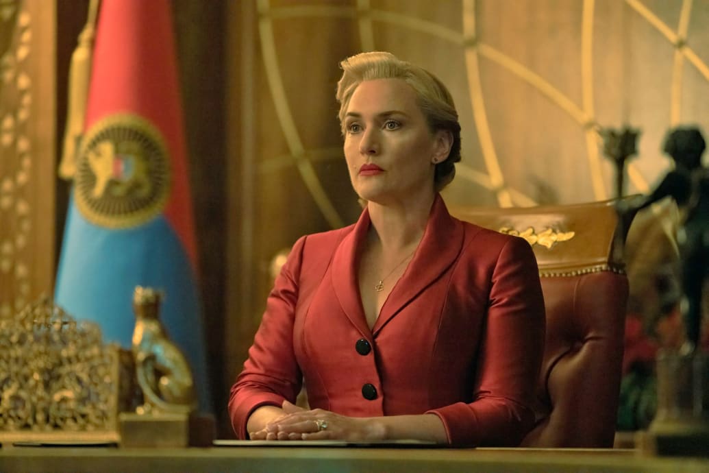 Kate Winslet sits at a desk in a still from 'The Regime'