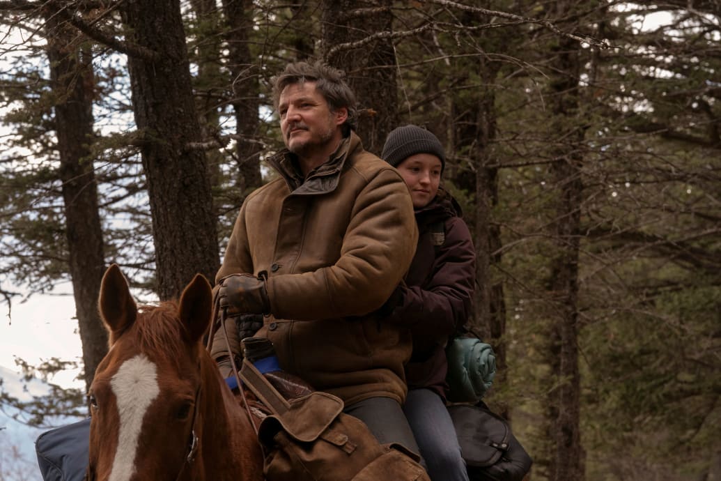 A still from The Last of Us showing Pedro Pascal and Bella Ramsey.