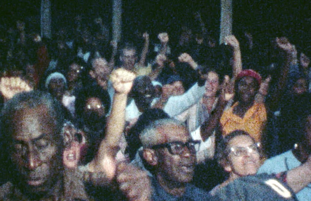 Members of the Peoples Temple gather at an event in Jonestown, Guyana.