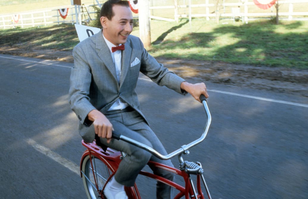 production still image of Paul Reubens in a scene from Pee-wee's Big Adventure.