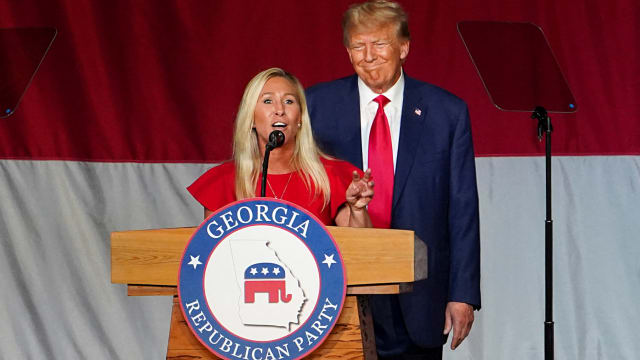Donald Trump and U.S. Rep. Marjorie Taylor Greene attend the Georgia Republican Party convention in Columbus, Georgia, on June 10, 2023.  