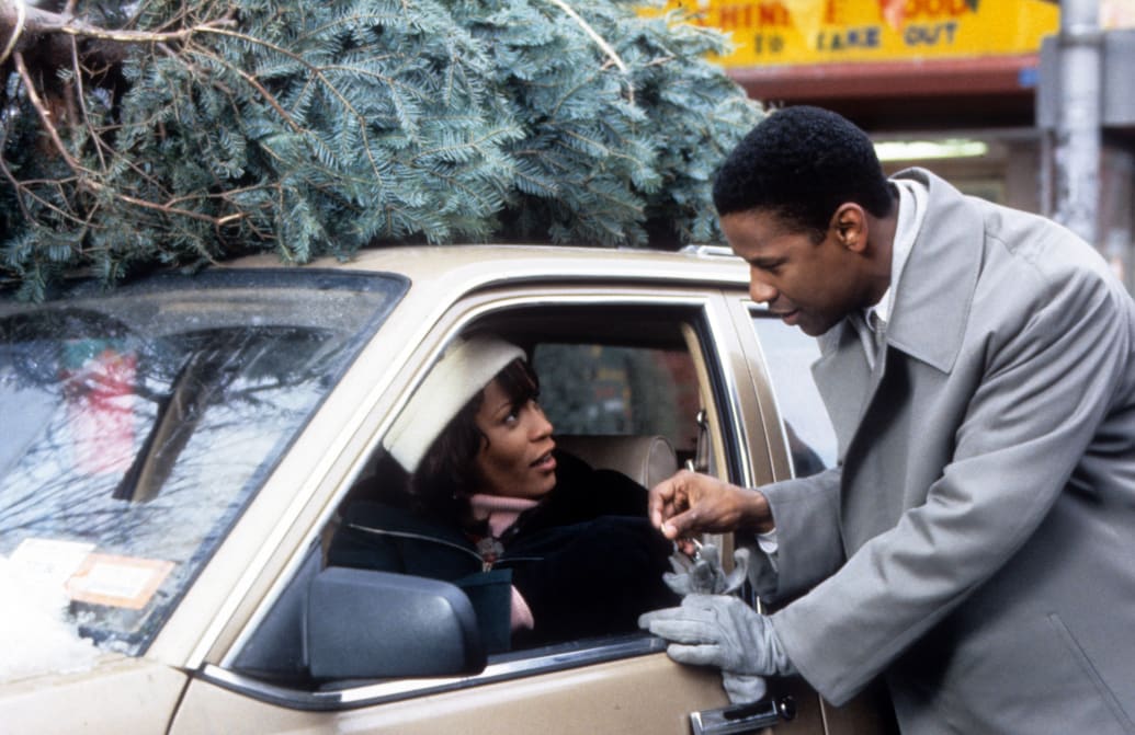 Whitney Houston and Denzel Washington in the The Preacher's Wife.