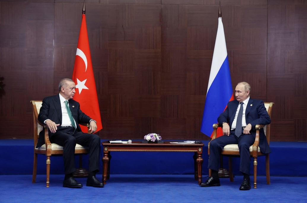 A photo of Russia's President Vladimir Putin and Turkey's President Tayyip Erdogan meeting at the CICA conference in 2022.
