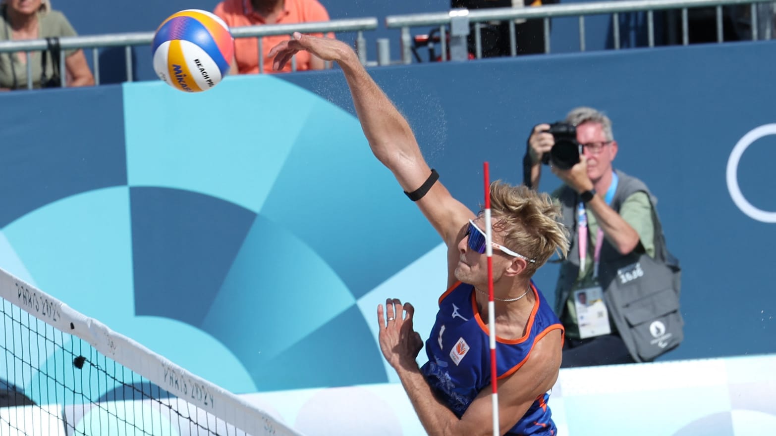 Steven van de Velde hitting a beach volleyball