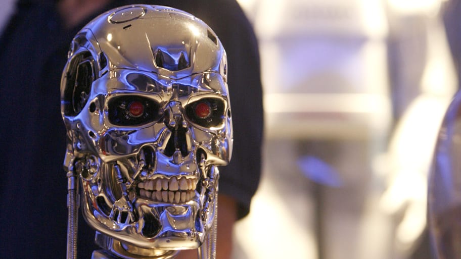 A visitor stands in front of a replica of the T-800 Endoskeleton of the movie “Terminator 2” at the Museum fuer Gestaltung (Museum of Design) in Zurich June 30, 2009.