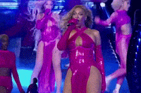 Gif of Beyonce performing in Hot Pink gown