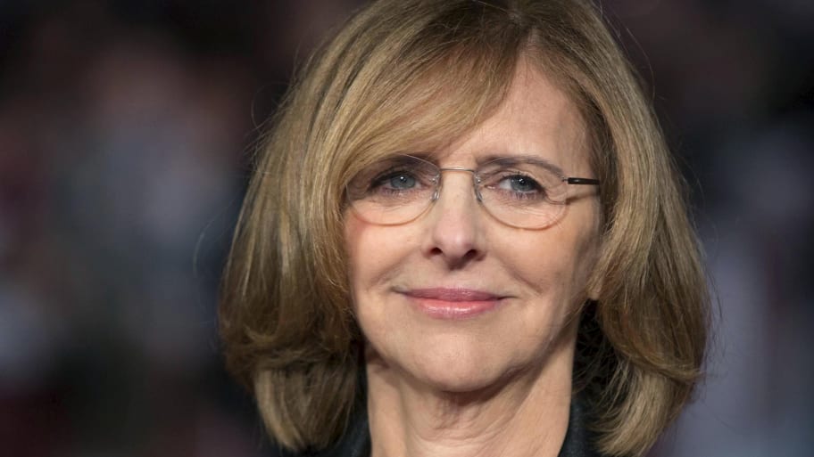 Nancy Meyers poses on a red carpet