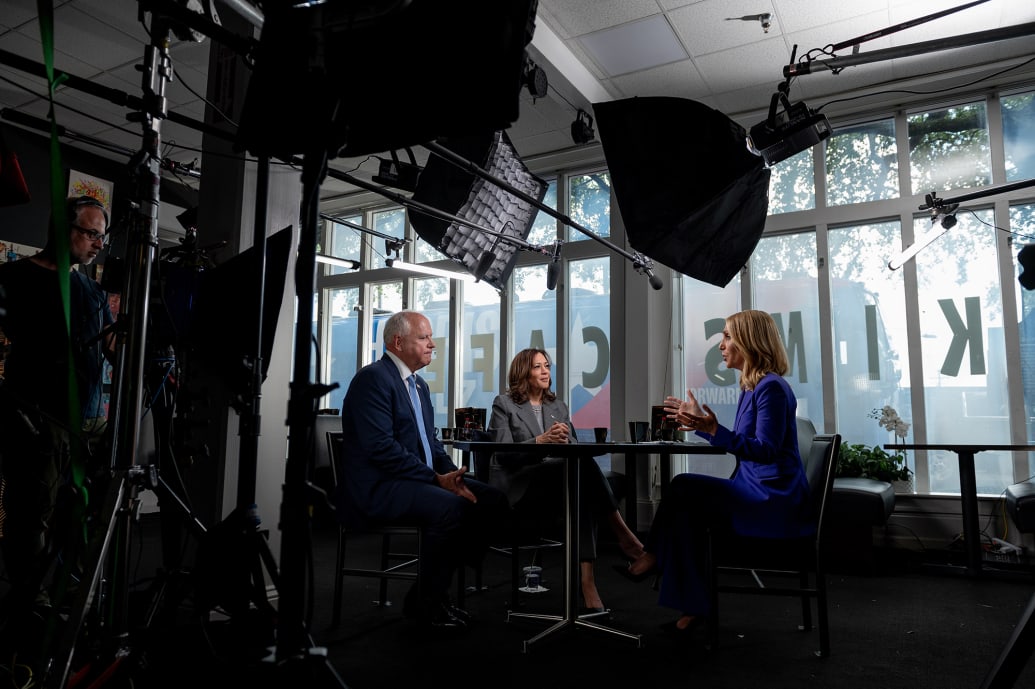 MinnesoMinnesota Gov. Tim Walz and Vice President Kamala Harris are interviewed by CNN’s Dana Bash at Kim’s Cafe in Savannah, Georgia, on August 29, 2024.