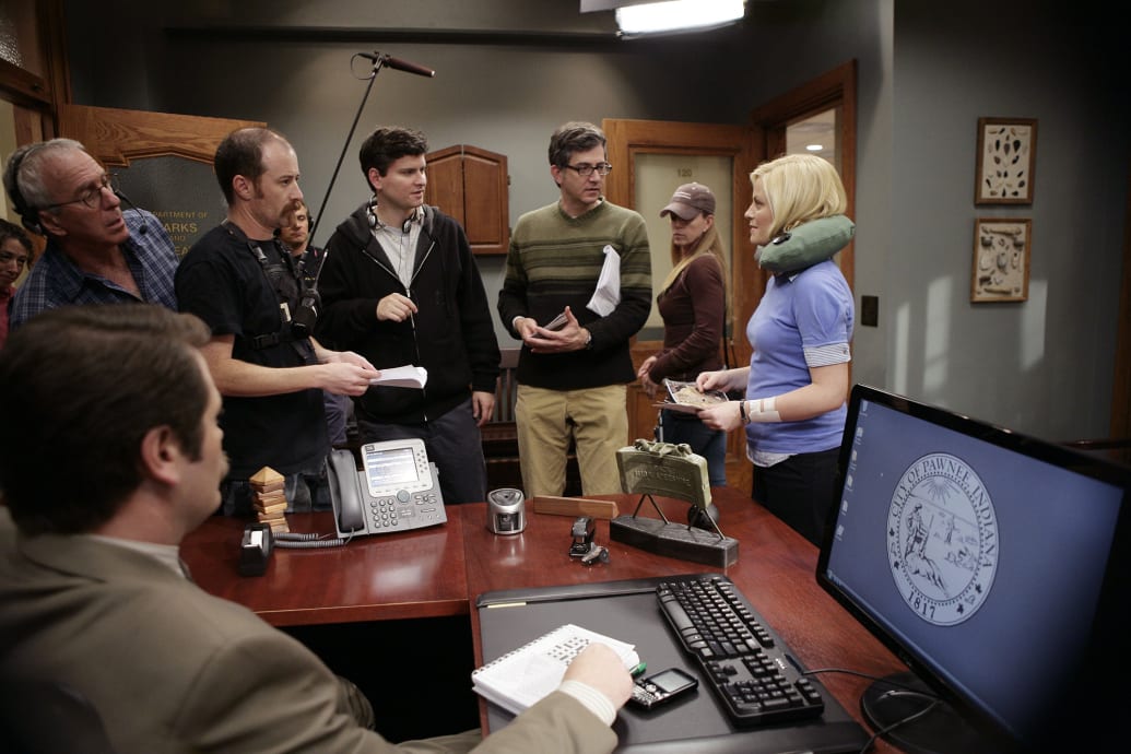 Nick Offerman as Ron Swanson, co-creator Mike Schur, co-creator Greg Daniels and Amy Poehler as Leslie Knope.