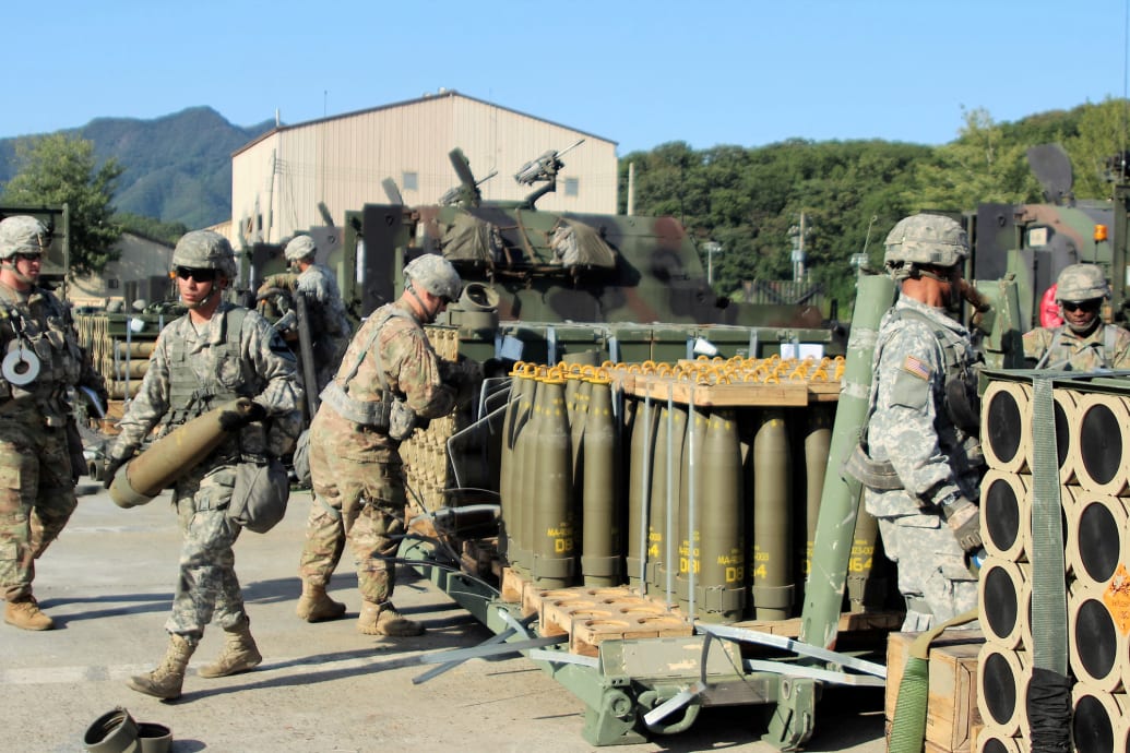 US Army soldiers carry 155mm grenades during a military exercise in South Korea in 2016.
