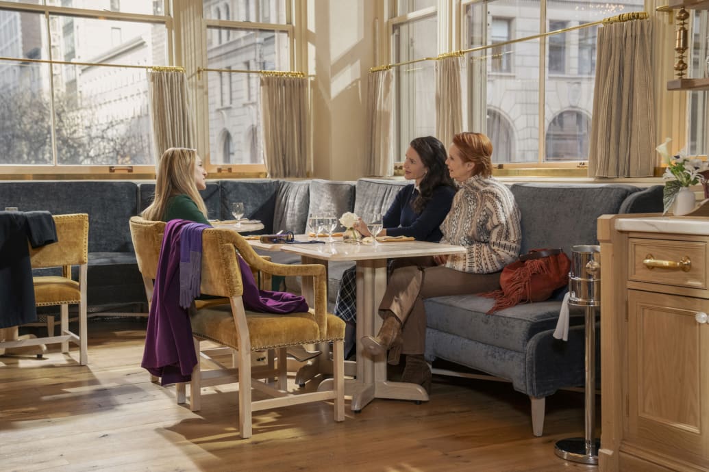 A photo still of Sarah Jessica Parker, Kristin Davis, and Cynthia Nixon in episode 7 of And Just Like That.