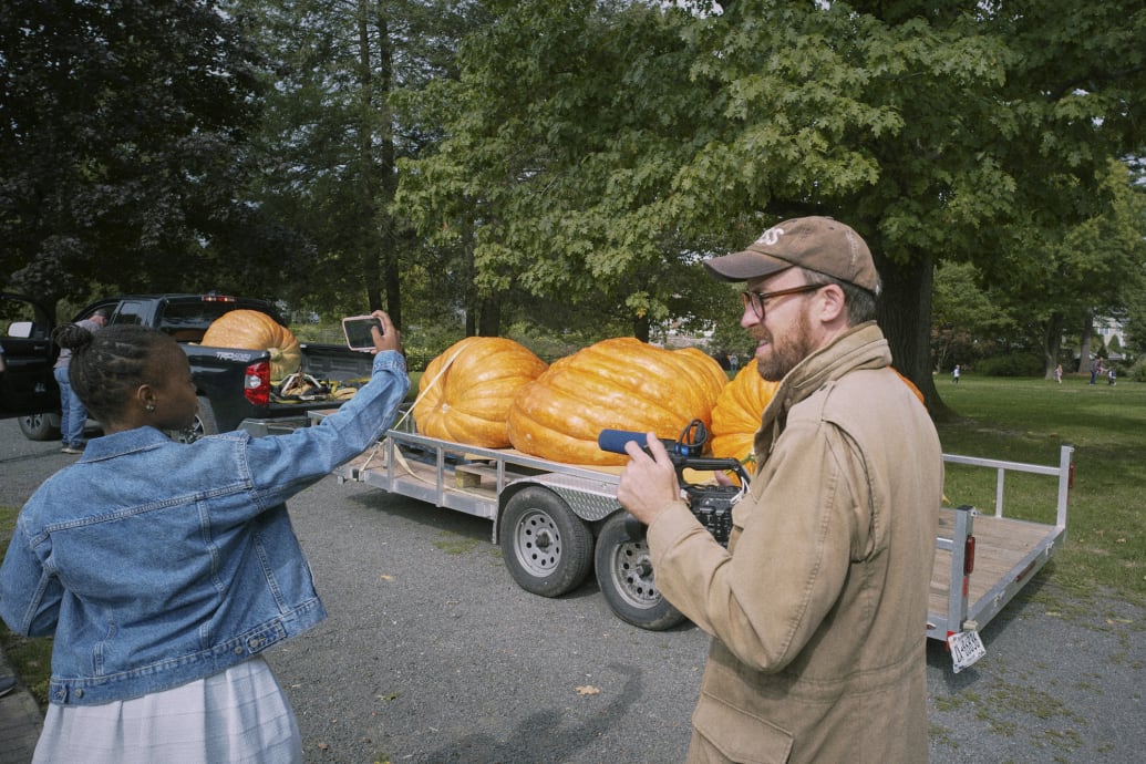 John Wilson at a giant pumpkin growing contest.