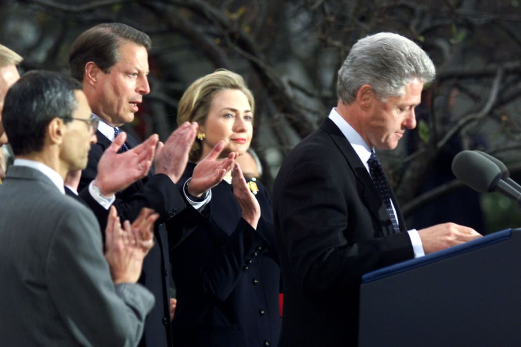 President Bill Clinton speaks alongside Vice President Al Gore and first lady Hillary Clinton after the House of Representatives voted to impeach him on Dec. 19, 1998