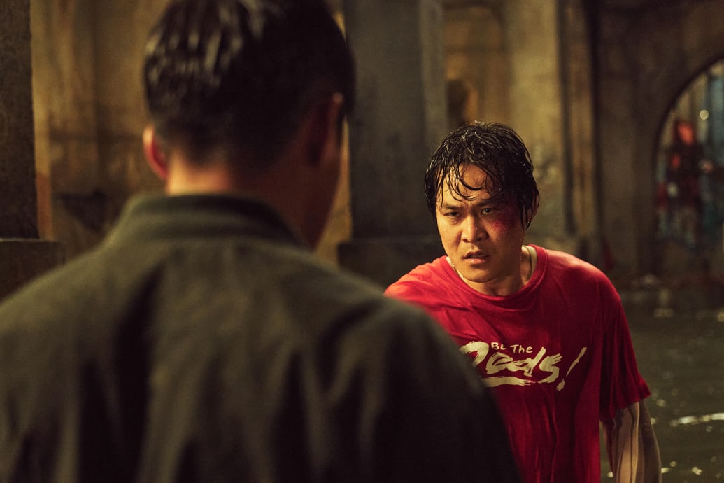 A production still of Lee Jaeman from Moving.