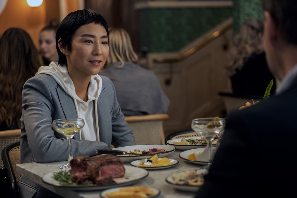 A production still of Greta Lee in The Morning Show.