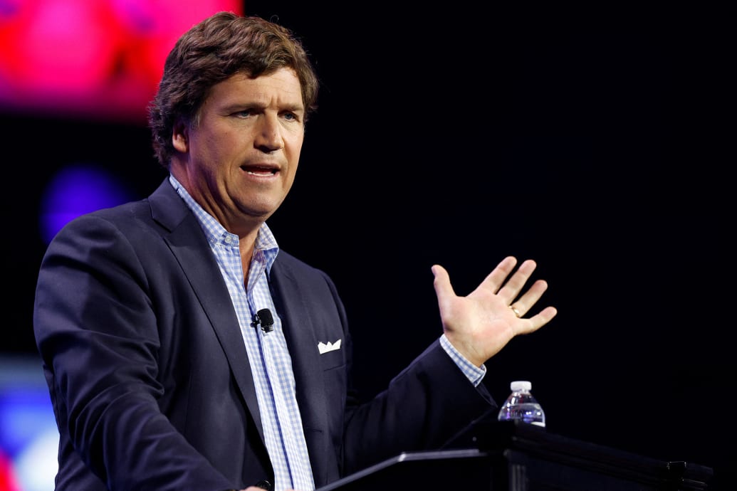 Former Fox News commentator Tucker Carlson speaks during the TPA Conference in Florida.