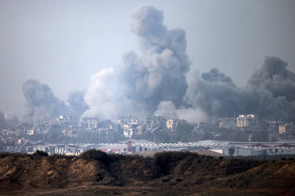 Israeli forces bomb the Gaza Strip.