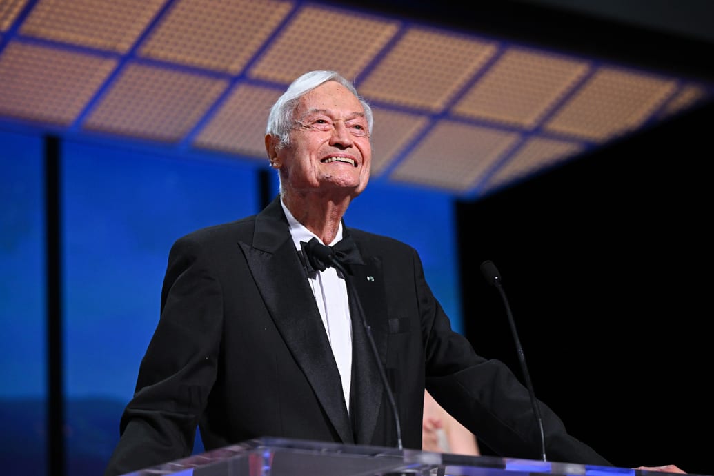 Roger Corman presents The Grand Prix Award during the closing ceremony during the 76th annual Cannes film festival.
