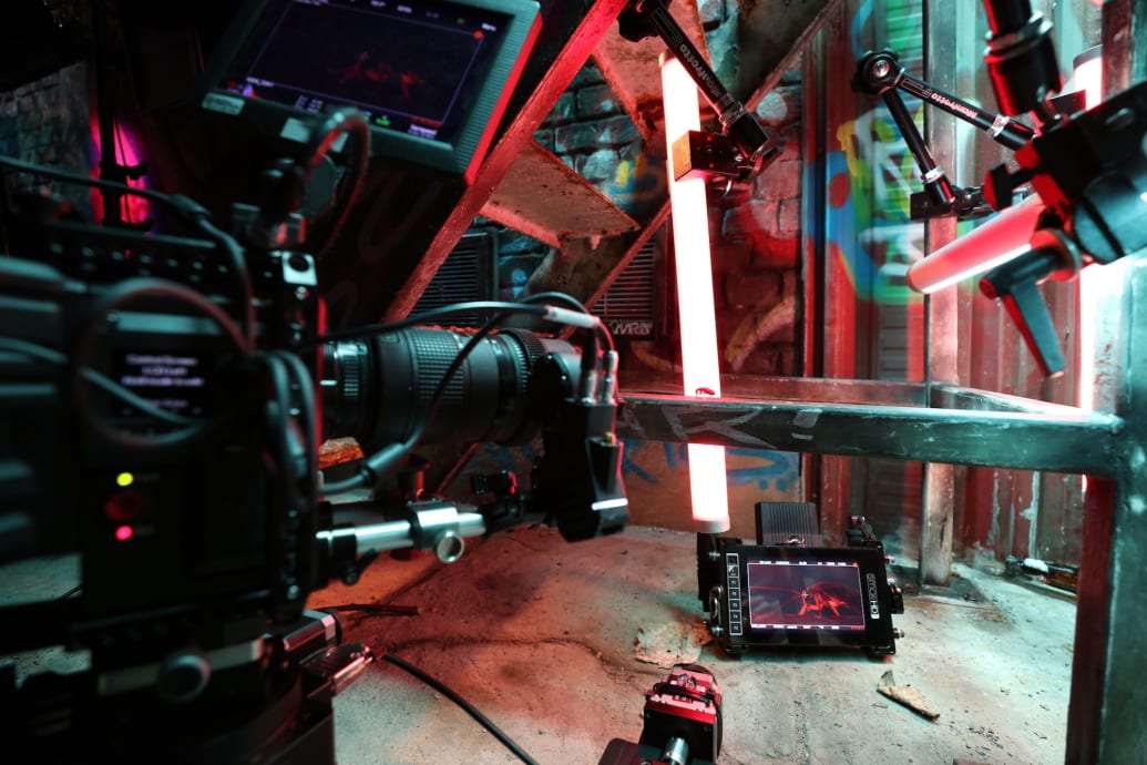 A cockroach is pictured in a monitor during a shoot for "The Big City" episode 
