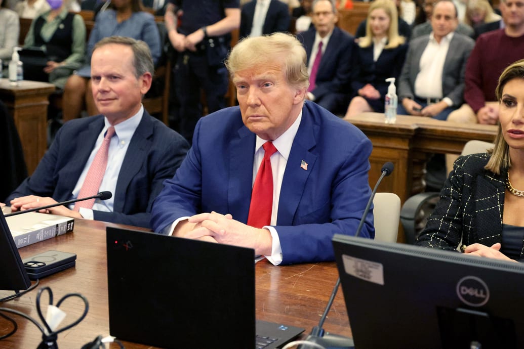 Donald Trump sits in the courtroom during his civil fraud trial at New York Supreme Court.