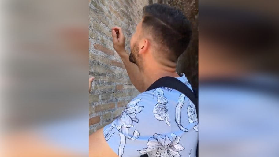 An Italian tourist carved his name into the wall of the Colosseum in Rome