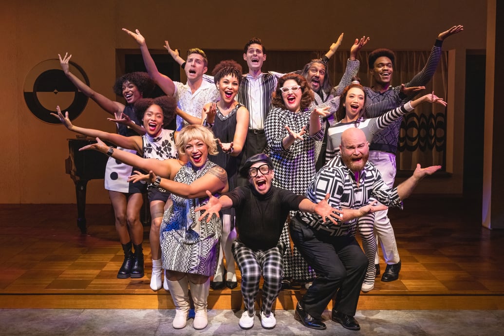 The "Merrily We Roll Along" company on Broadway perform as "the Blob."