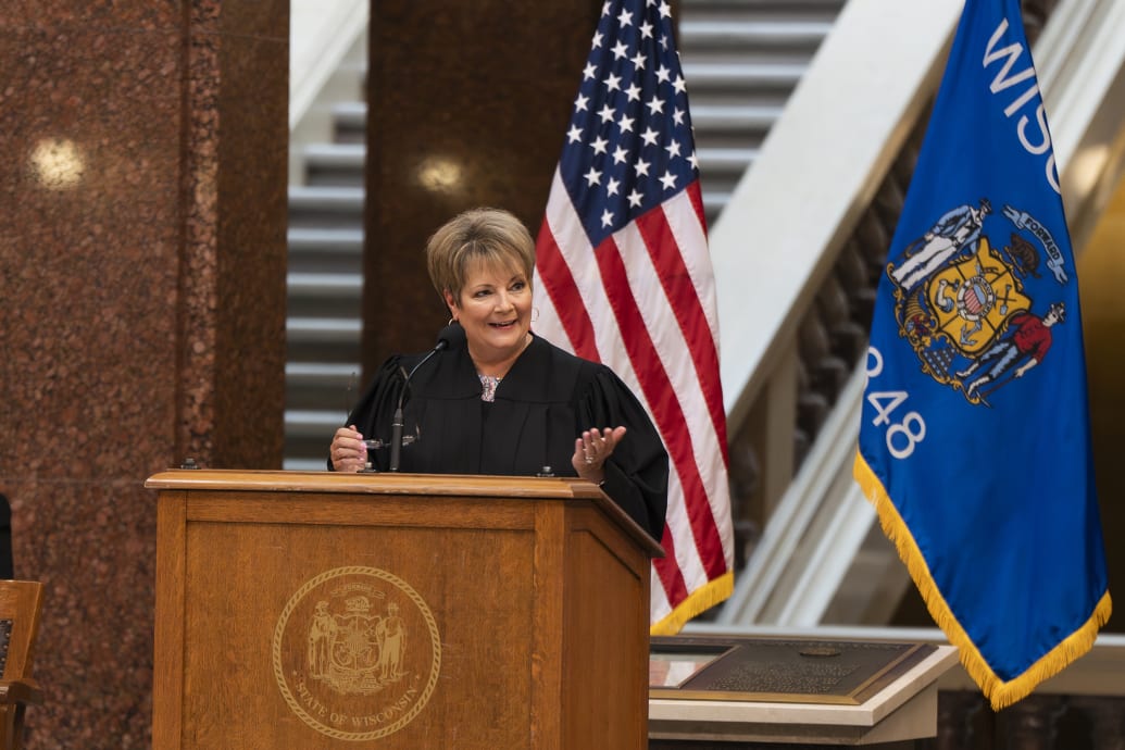 Janet Protasiewicz, 60, speaks during her swearing in ceremony State Supreme Court Justice at the Wisconsin Capitol.