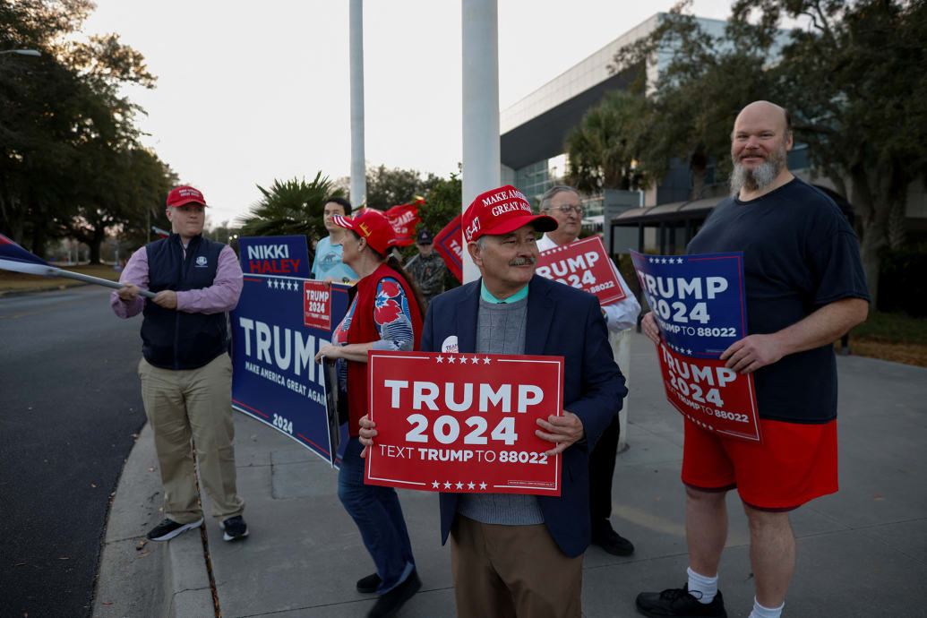 Supporters of former President Donald Trump gather outside a rally of Nikki Haley.