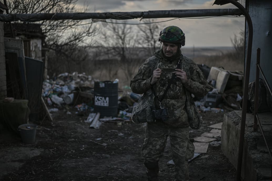 Vitaliy, a soldier of the 17th Tank Brigade in a ruined village near Chasiv Yar, Ukraine.
