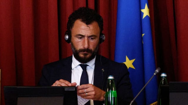Italian MP Emanuele Pozzolo takes part in a meeting in Rome. 