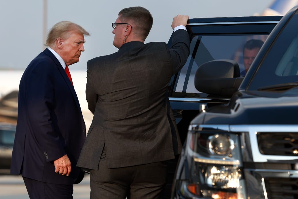 Former U.S. President Donald Trump arrives at Atlanta Hartsfield-Jackson International Airport in Atlanta, Georgia.