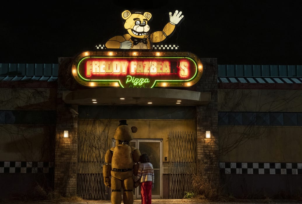 The neon sign in front of Freddy Fazbear’s Pizza