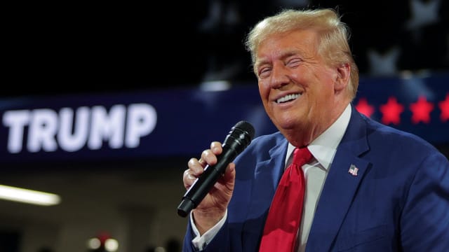 Republican presidential nominee and former U.S. President Donald Trump holds a campaign town hall meeting, moderated by Arkansas Governor Sarah Huckabee Sanders, in Flint, Michigan, U.S., September 17, 2024.  