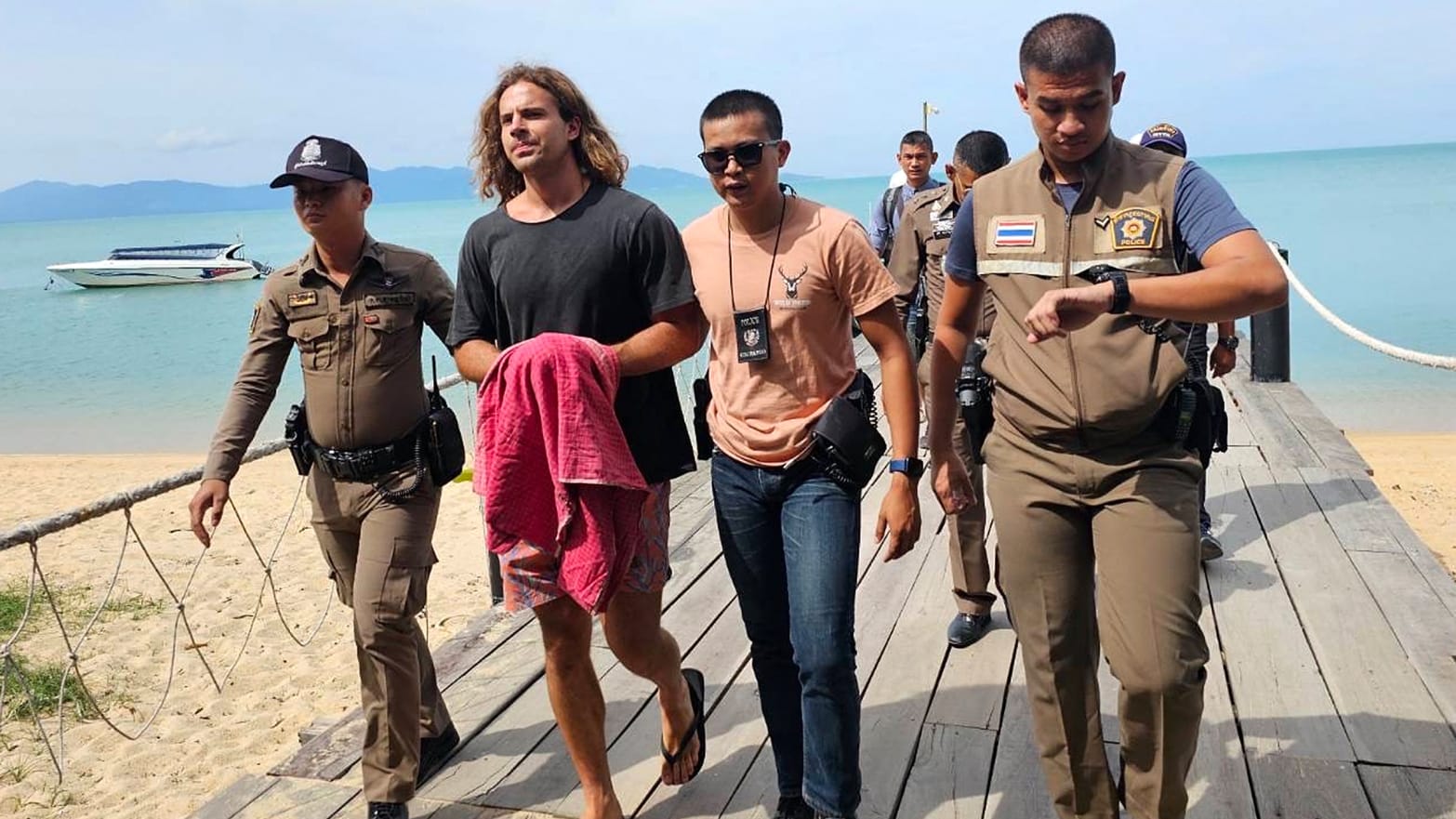 Convicted murderer Daniel Sancho Bronchalo is escorted by Thai police in August 2023.