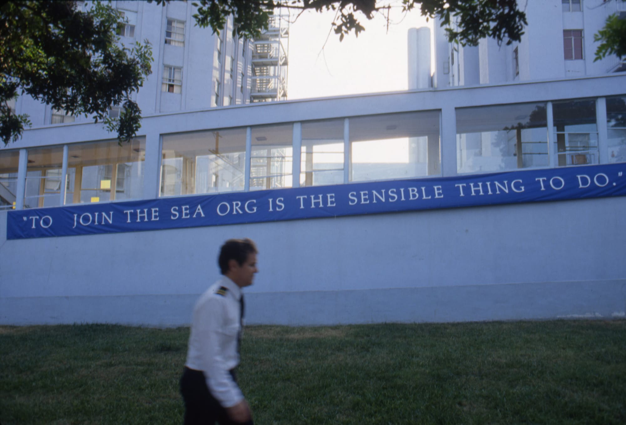 A member of the Sea Org walks outside the Church Of Scientology in Los Angeles.