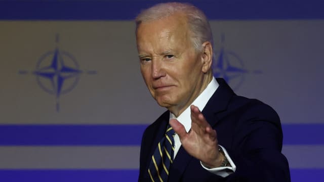 President Joe Biden waves at a NATO event to commemorate the 75th anniversary of the alliance, in Washington, D.C., July 9, 2024.