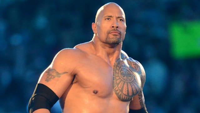 Dwayne ''The Rock'' Johnson looks on during his match against John Cena during WrestleMania XXVIII in 2012
