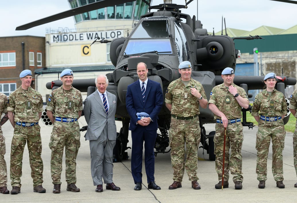 King Charles and Prince William, Prince of Wales during the official handover in which Charles passes the role of Colonel-in-Chief of the Army air corps to William at the Army Aviation Centre on May 13, 2024 in Stockbridge, Hampshire.