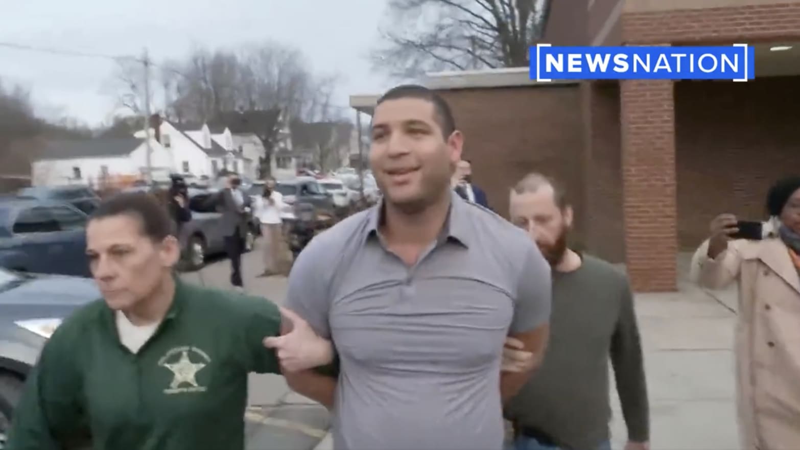 NewsNation’s Evan Lambert being arrested by police in Ohio
