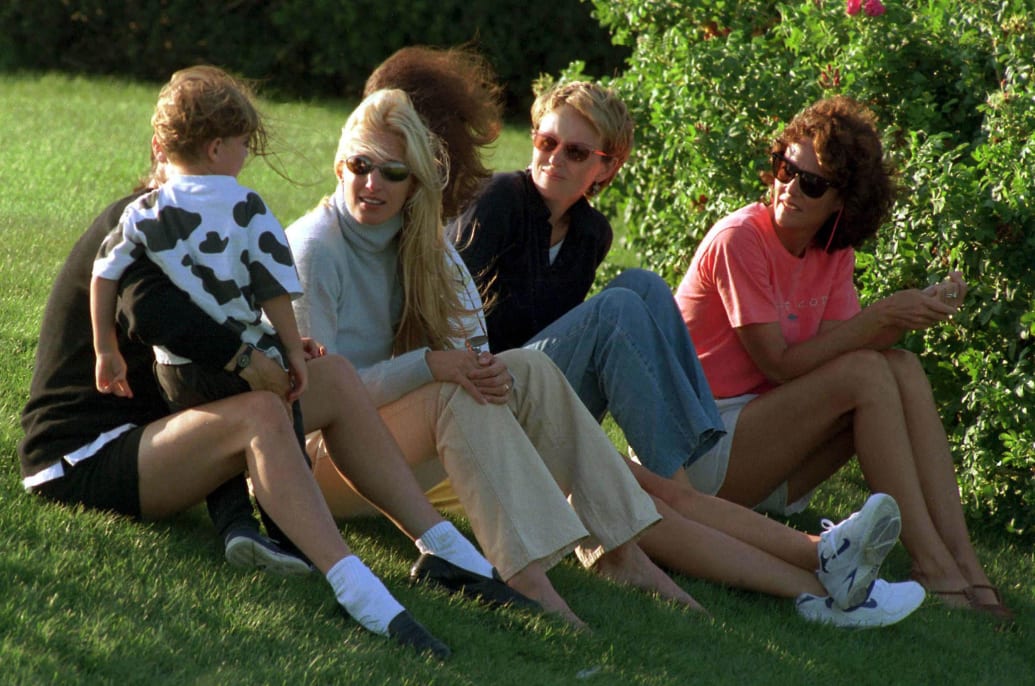 Carolyn Bessette-Kennedy (second from left) sits with members of the Kennedy family at the Kennedy compound in Hyannisport, Massachusetts on June 15, 1997.