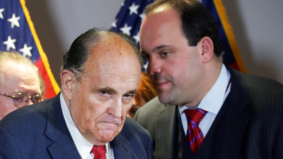 A picture of former New York City Mayor Rudy Giuliani and Trump campaign advisor Boris Epshteyn, who might possibly fit the description of co-conspirator 6 in Trump’s indictment over his efforts to overturn the 2020 election.