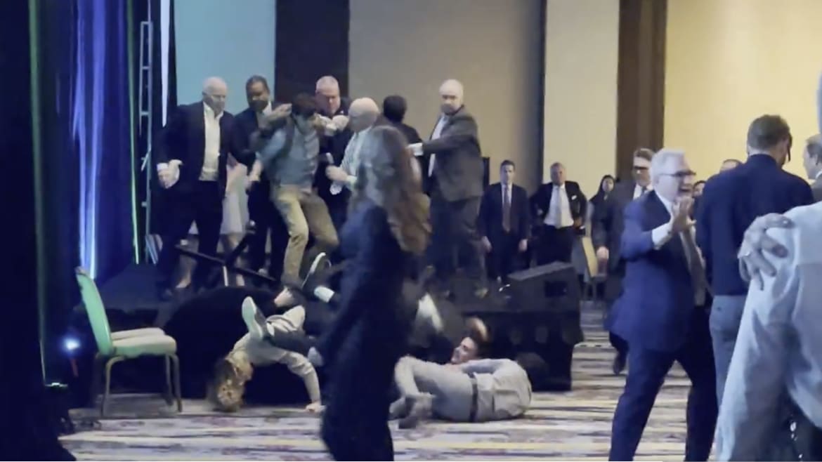 Climate Protesters Tumble Off Stage During Scuffle at GOP Senator’s Speech
