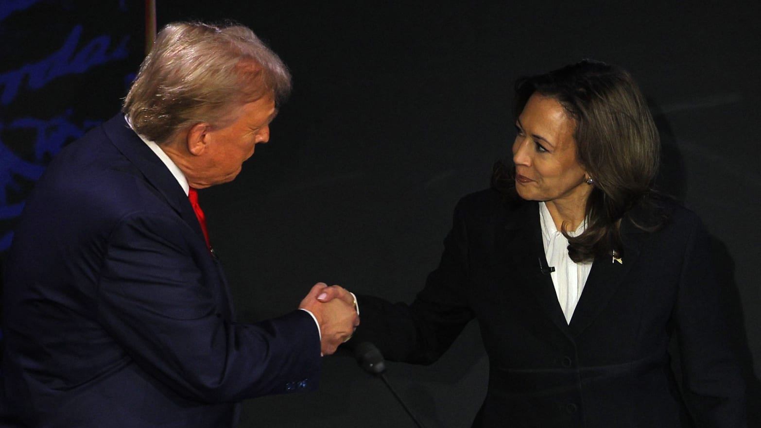 Donald Trump and Kamala Harris shake hands before Tuesday’s debate.