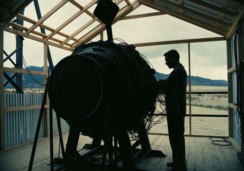 Cillian Murphy as J. Robert Oppenheimer works on the atomic bomb.