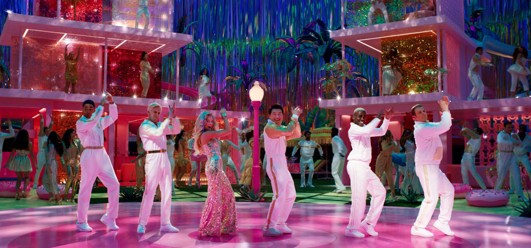 The cast of Barbie dancing in a still from the movie